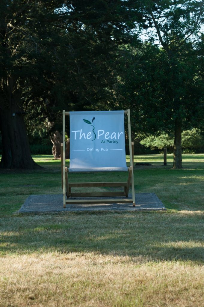 Large Deck Chair in the grounds of the pear at parley restaurant in west parley, ferndown, dorset